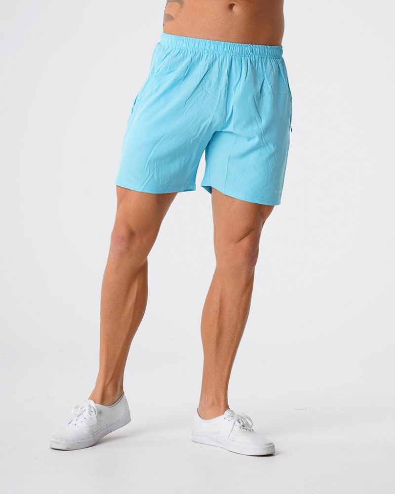 NVGTN Flex Miesten Shortsit Vaaleanturkoosi | FI314WN