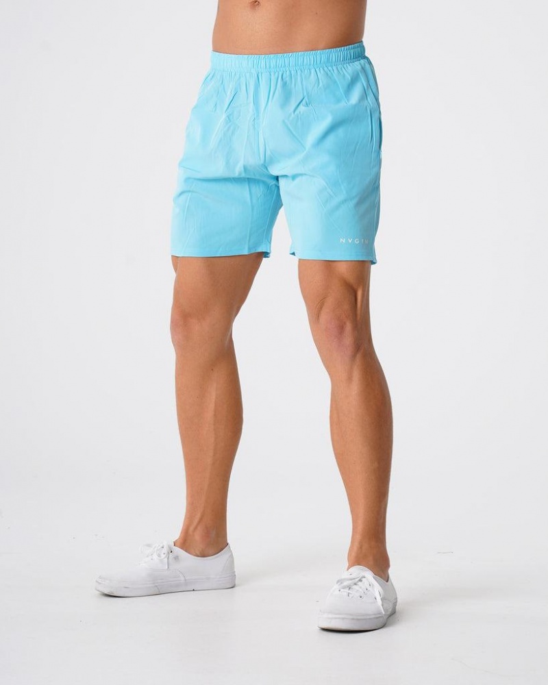 NVGTN Flex Miesten Shortsit Vaaleanturkoosi | FI314WN